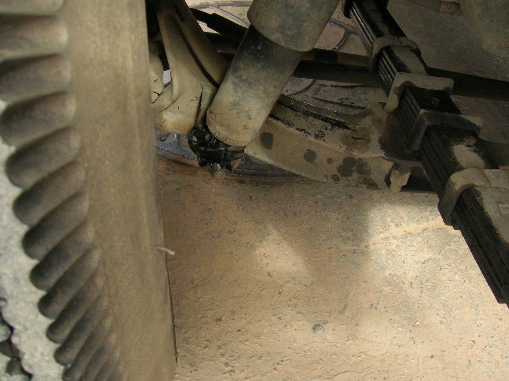 Tie wraps on right front shock absorber