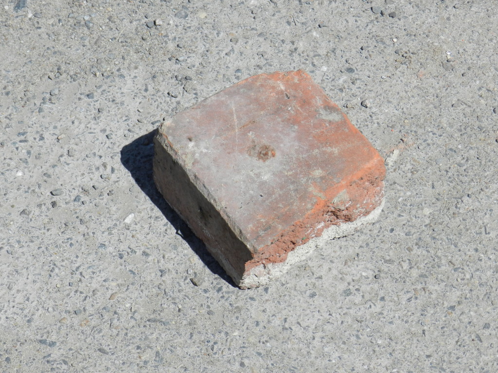 Russian brick used to help jack up the Roadster