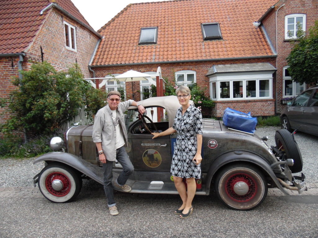 The Roadster and I in front of the B&B with the owner...she and her husband have a great MGA